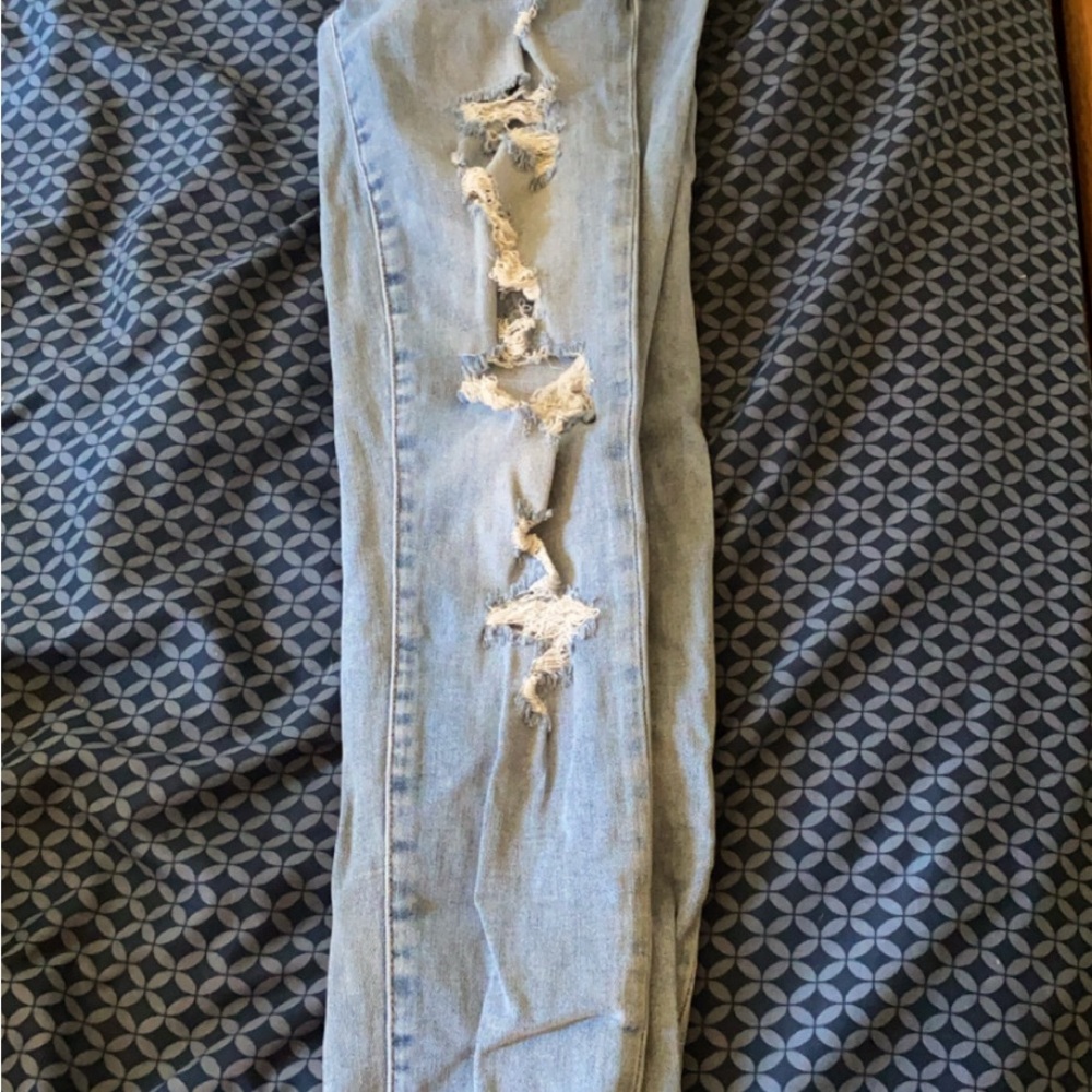 Distressed Light Blue Jeans